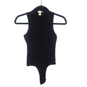 Bozzolo one piece black top with deep cut arm holes in back